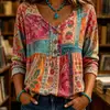 Nuevo top de manga tres cuartos suelto con estampado y cuello en V, estilo europeo y americano, para mujer, adecuado para uso casual, vacaciones y con un aire retro.