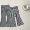 Pantalones Estilo Coreano para Niños 2026 Otoño Nuevo Estilo Moda para Bebé Versátiles Ajuste Delgado Estampado de Leopardo Lunares Pantalones de Campana Pantalones Largos Modernos