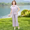 Conjunto de verano para mamá, elegante conjunto de dos piezas de blusa de gasa, nuevo modelo 2026, moderno conjunto de dos piezas con top de manga corta para mujeres de mediana edad y mayores