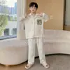 Pijama de algodón puro para niños estilo coreano, alta calidad para niños mayores, conjunto de ropa de casa para niños adecuado para usar al aire libre