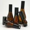Botella de vidrio de calabaza única de múltiples especificaciones, botella con atomizador, botella con dispensador de emulsión, botella de aceite esencial de color té, botella de solución madre embotellada