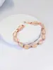 Pulsera Geométrica de Piedra Ojo de Gato de Lujo Ligero para Mujer, Joyería de Moda Versátil de Alto Nivel en Oro Rosa y Dorado, Accesorio Popular para la Mano