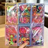 Mini cabeza de princesa en caja pinza pequeña de agarre flequillo pinza frente horquilla rota banda de goma para niños no lastima anillo para el pulgar venta al por mayor