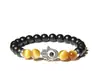 Pulsera de Ojo de Tigre Negro y Amarillo con Amuleto Mano de Fátima Ajustable y Elegante Unisex Perfecta para Protección Espiritual Accesorio de Moda y Uso Casual