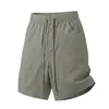Verão 2026 Novos Shorts de Linho de Liocel Masculino Largos Modernos Versáteis Casuais Calças de Cinco Pontos Calças de Praia Algodão