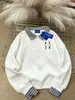 Sudadera de moda estilo americano con diseño de dos piezas cosido y cuello polo para mujer, Invierno 2025, Holgada, Casual, de peso pesado