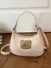 Bolso de cuadros de nicho exquisito y moderno para mujer, nuevo modelo 2026, minibolso cruzado versátil, bolso tipo dumpling, bolso de mano pequeño para salir