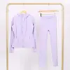 Conjunto Lulu Df de Jaqueta com Capuz e Calça Cropped, Jaqueta Stretch Ajustada com Gola Alta e Zíper Dourado, Roupa para Fitness e Yoga