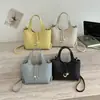 Elegante bolso de mano con patrón de lichi, bolso de hombro versátil de colores texturizados para primavera-verano, bolso cruzado de diseño para el trabajo, moderno