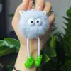 Explosiones de red creativa felpa piernas largas colgante bolita de carbón pequeño oreja de elfo bola de pelo llavero colgante de bolso regalo mayoreo