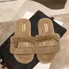 Pantuflas peludas con letras de suela blanda estilo europeo para mujer, adecuadas para usar en exteriores, pantuflas de algodón para interior estilo hada para otoño e invierno 2025