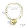 Joyería transfronteriza de San Valentín más vendida Aretes de flor de rosa roja Collar de corazón Conjunto Aretes de San Valentín europeos y americanos
