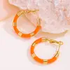 Pendientes de aro y tachuelas de acero de titanio de lujo de alta gama, de colores esmaltados, para mujer, estilo dulce y fresco, pendientes versátiles, en stock, al por mayor
