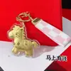 Zhongshuibei Oro Imitación 999 Hazte Rico Inmediatamente 20mg Contenido de Oro Bolsita para Teléfono Móvil Colgante para Llavero Lindo Regalo para Novia