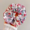 Nuevos coleteros de tela de verano con alto atractivo estético, pequeñas ligas florales para el cabello, accesorios para el cabello lindos y versátiles