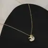 Cadena de Clavícula Elegante Chapada en Oro Real con Circonita Microincrustada Diseño de Nicho Femenino Cadena de Collar Versátil Exquisita Estrella de Cuatro Mans
