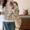 Nuevo suéter de punto a rayas para mujer, con un diseño único, holgado y casual, en un estilo universitario juvenil, con una abertura en la espalda
