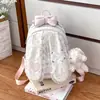 Colección de otoño 2026 de estilo japonés transfronterizo: mochila de encaje con lunares y flores y orejas de conejo, versátil para ir al trabajo, elegante y de alta calidad