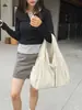 Bolsa de tela ligera casual de gran capacidad transfronteriza para mujer, nuevo bolso versátil simple para el hombro o debajo del brazo 2025, bolsa de mano para el trabajo