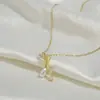 Collar de Lazo de Perlas para Niñas Estilo Ins Hip Hop Diseño de Nicho 2023 Nueva Moda Cadena Ligera de Lujo Colgante de Hueso