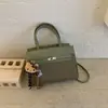 Bolsa de Ombro Transversal Casual Fashionable Estilo Ins Nova Coleção Primavera 2026 Bolsa de Mão Simples de Alto Valor para Mulheres