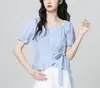 Camisa de mujer a rayas azules, camisa elegante de manga corta estilo francés, verano talla grande 2026, nuevo top adelgazante que ciñe la cintura