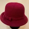 Nuevo sombrero de otoño e invierno estilo coreano con lazo, elegante sombrero tipo cubo de fieltro de lana estilo británico para mujeres de mediana edad y mayores