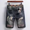 Shorts de Mezclilla Patchwork Rasgados para Hombre 2026 Moda Tendencia Estilo Personalidad Shorts Versátiles Venta al por Mayor Transfronteriza