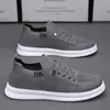 2026 Novos Sapatos de Malha Respirável Masculinos Sapatos Esportivos Masculinos Estilo Coreano Tendência Versátil Antiderrapante Flyknit Casuais Sapatos de Lona