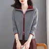 Suéter de cremallera doble 2026 para mujer, top de punto de manga corta de moda con un cuello elegante, corte holgado, moderno y rejuvenecedor.