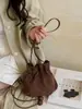 Bolso de la suerte de ante con estampado de leopardo de alta gama 2026 nuevo estilo vintage bolso de hombro bolso cubo plisado otoño e invierno bolso cruzado