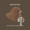 Sombrero de Paja con Cinta Francesa de Espalda Dividida Cubre-Rostro Protector Solar para Mujer Estilo Japonés ins Sombrilla de Viaje Sombrero de Pescador Venta al por Mayor