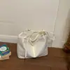Bolsa de Couro Macio de Alta Qualidade para Mulheres 2026 Nova Tendência Simples Grande Capacidade Casual Versátil Ombro Único Ombro Duplo Bolsa Tote