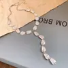 Pendientes Ovalados Metálicos Plegados Transfronterizos Europeos y Americanos, Conjunto de Collar y Pulsera, Cadena para Clavícula de Moda, Joyería de Gama Alta de Nicho