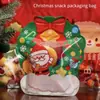Uma variedade de sacolas de presente de Natal, sacolas de presente para as festas, sacolas de doces e biscoitos para a véspera de Natal, sacolas de presente de mão