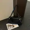 Bolso de hombro vintage de gran capacidad estilo coreano para el trabajo y los desplazamientos, moda de invierno 2026, bolso casual simple para debajo del brazo para mujer