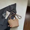 Bolso tipo cubo estilo relajado nuevo de verano 2026, Bolso cruzado de moda único y moderno para mujer, Bolso de mano elegante de alto valor