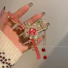 China Fu ~ 2023 Nuevo Festivo Año Nuevo Borla Pinza para el Pelo Pinza de Tiburón Antiguo con Sentido Avanzado Tocado Pasador de Pelo