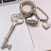 Estilo ins japonés y coreano colgante de llave de amor de metal plateado diseño nicho personalizado llavero para pareja colgante para bolso