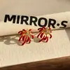Pendientes Únicos y Deslumbrantes de Esmalte con Fuegos Artificiales de Circonita Roja con un Toque de Lujo de Alta Gama, Pendientes de Tachuela Otoño e Invierno para Mujer