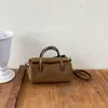 Bolsa Estilosa Xiaomi Niche Porta-Canetas Outono 2026 Nova Bolsa Almofada Retro de Alto Valor para Mão Bolsa de Ombro Transversal para Mulheres