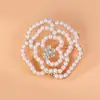 Broche de pérola em liga para mulheres atacado temperamento de alta qualidade pin de flor doce corsage anti-luz versátil acessórios