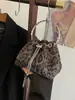 Bolso de mano con estampado de leopardo para mujer, nueva colección otoño/invierno 2026, bolso de cadena de moda retro de nicho, bolso de hombro, bolso cruzado