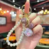 Chaveiro de Corrente com Pérolas e Bola de Diamantes Brilhantes Novo Estilo Transfronteiriço Pingente para Bolsa de Meninas Estilo Ins Ornamento Pequeno Exquisito