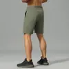 2026 Comercio Exterior Transfronterizo Amazon Nuevos Pantalones Deportivos Casuales de Verano para Hombre Color Sólido Pantalones Cortos para Correr con Bolsillo Trasero