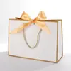 Bolsa de Mano Lazo Bolsa de Papel Impresión Bolsa para Prenda Bolsa de Regalo Bolsa de Compras Bolsa de Embalaje Bolsa Cosmética Color Comercio Exterior