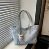 Estrella de Viaje de Comercio Exterior Versión Coreana 2026 Nueva Moda Bolso Tote Hombro con Colgante de Gran Capacidad para Oficinistas