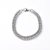 Pulsera de acero de titanio con doble hebilla para hombre europeo y americano 1.8 cadena de doble hebilla gruesa ancha plana personalidad hip-hop accesorios para mano de hombre y mujer al por mayor