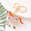 Regalo de Cumpleaños Caballo Rayado Llavero Creativo Anillo Animal del Zodiaco Potro Pedrería Colgante de Llave de Metal Venta al por Mayor