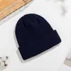 Gorro de lana tejido cálido para otoño e invierno, unisex, estilo europeo y americano, versátil, color liso, acrílico, comercio exterior, gorro para el frío, venta al por mayor en Amazon